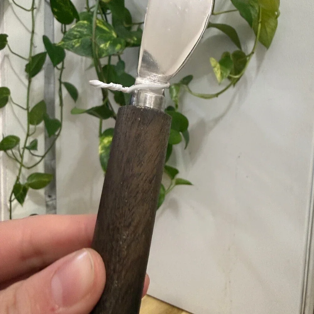 Silver and Brown Spreader Knife